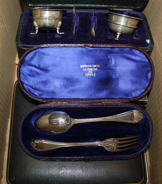 Five cased silver sets